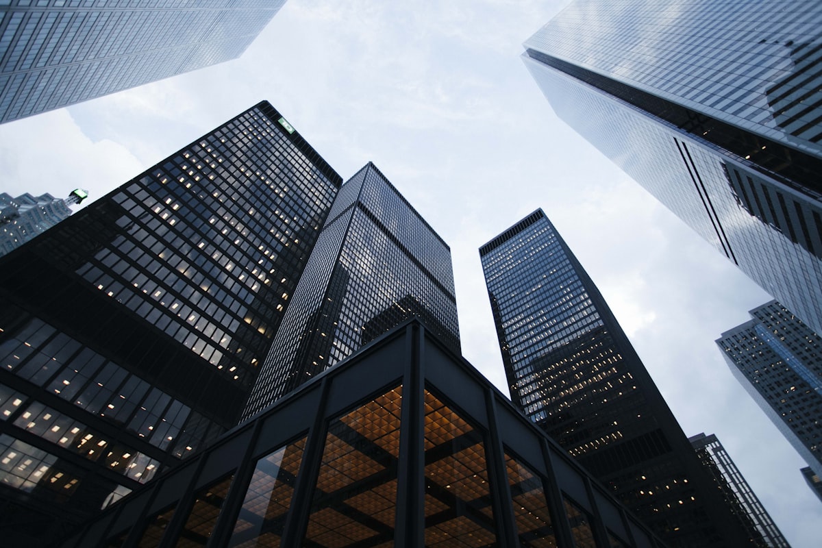 Low angle view of modern glass curtain wall building